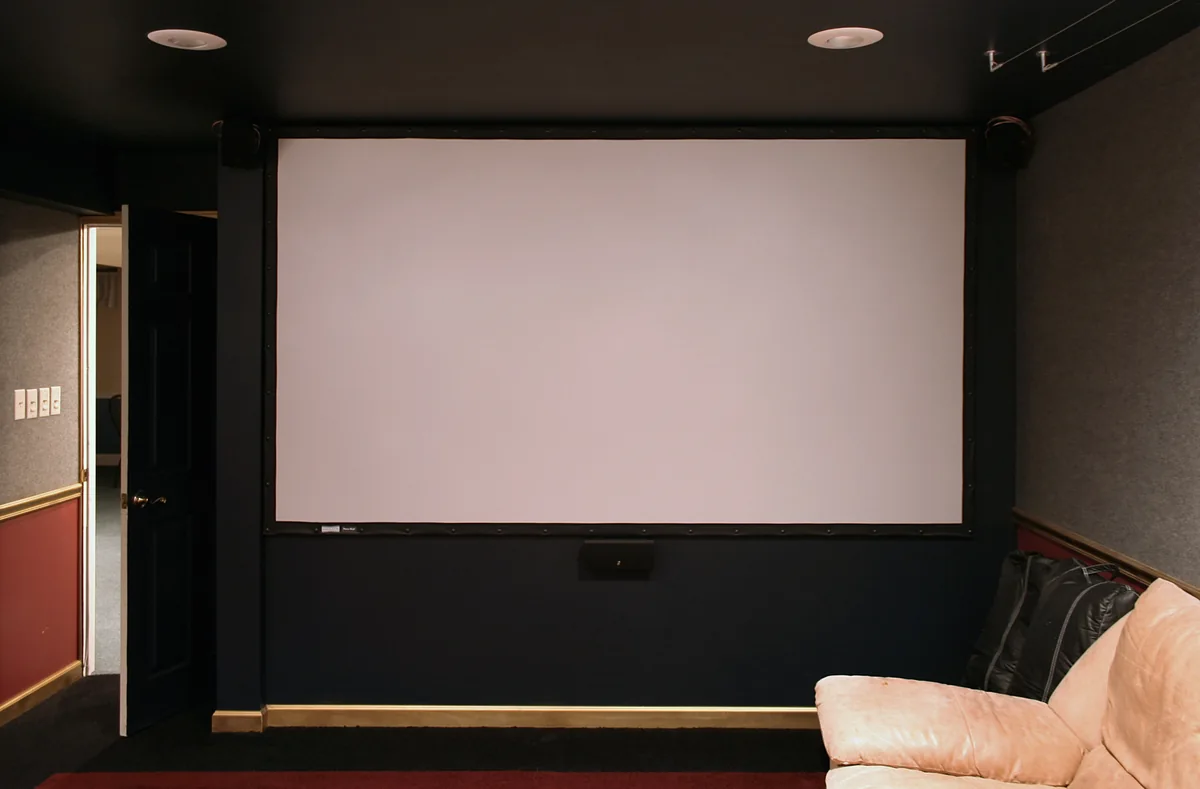 Projection screen in a home viewing room